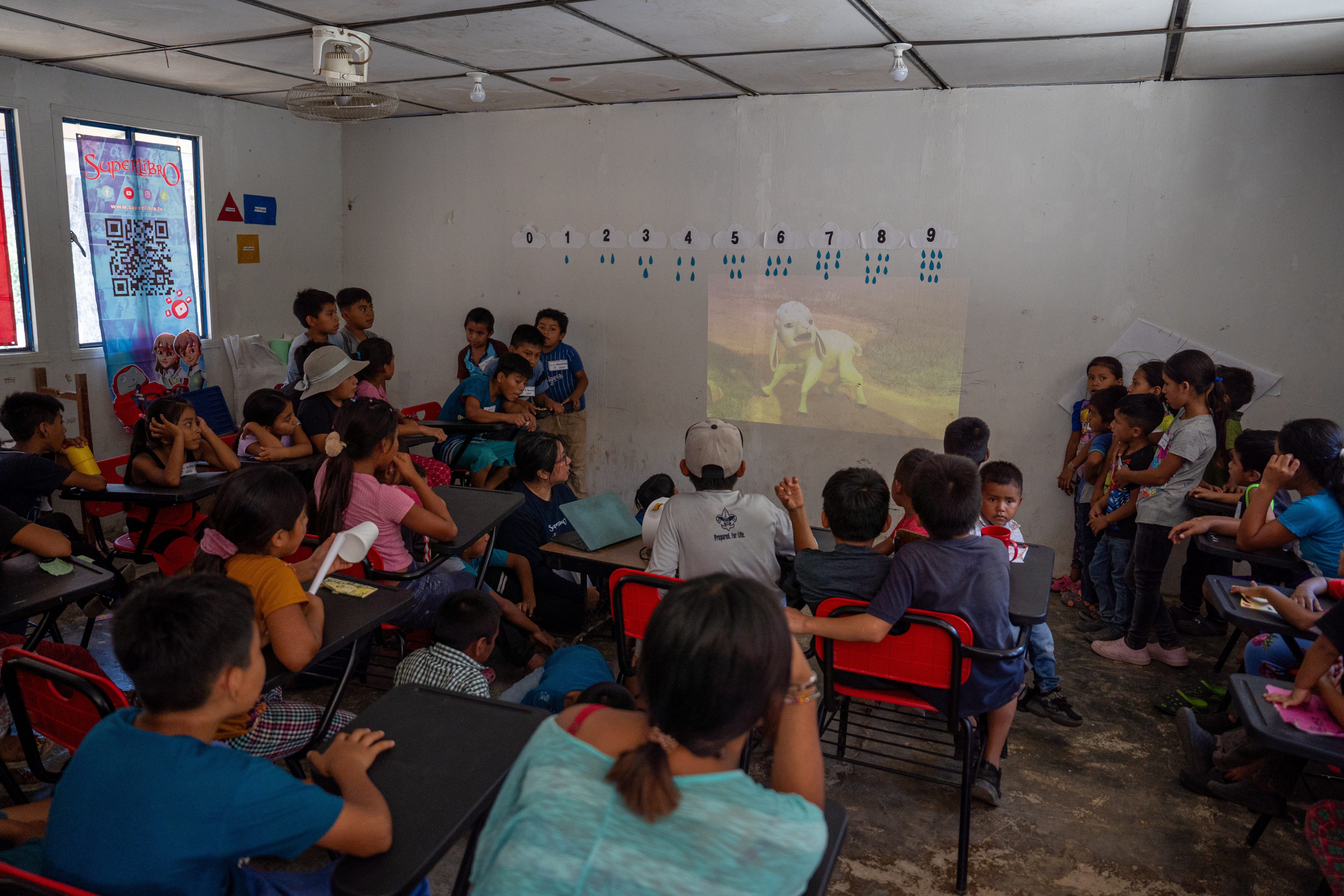 Children in Mexico watch "A Giant Adventure."