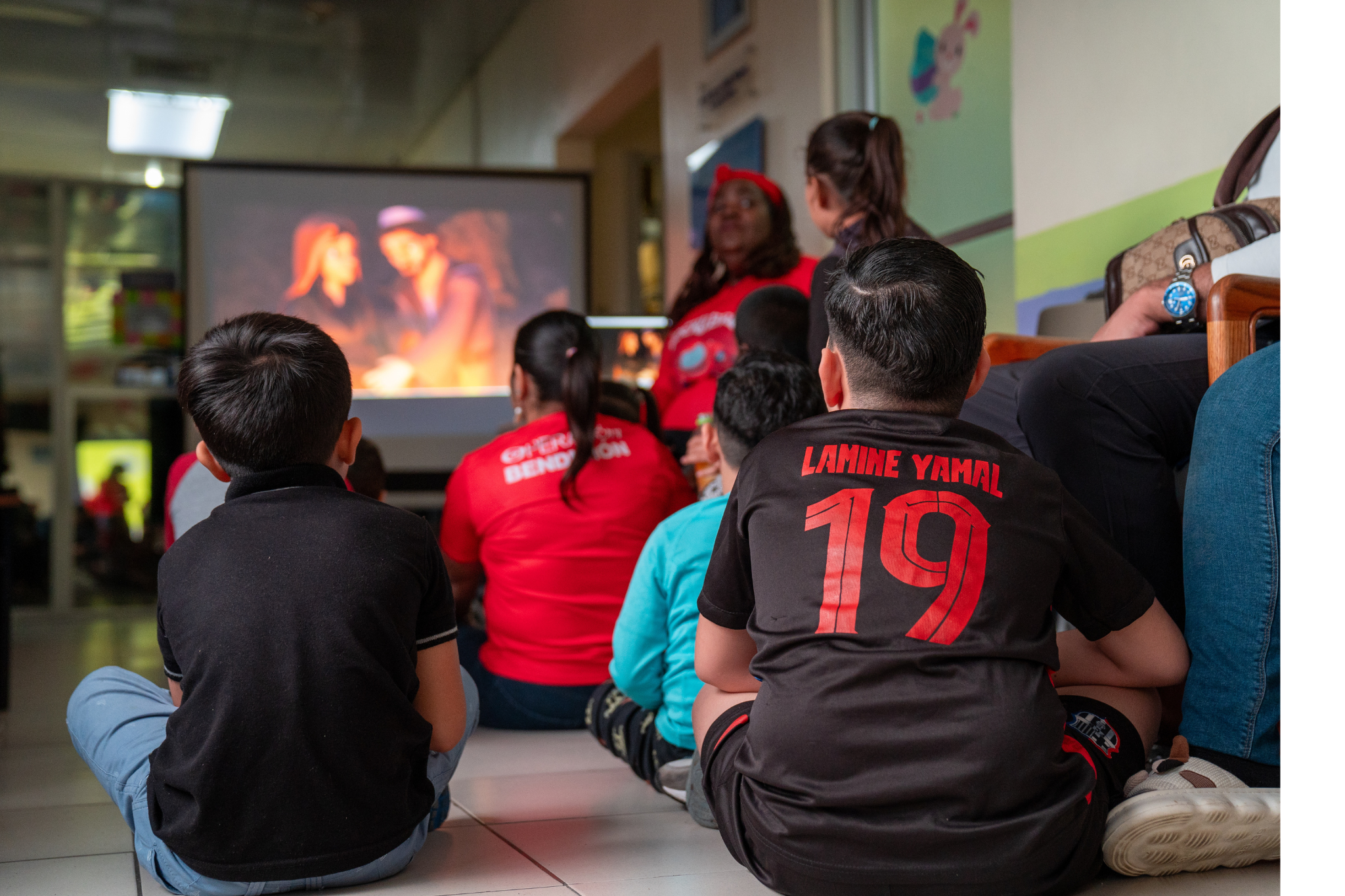 Children at Ruth Paz Hospital watch an episode of Superbook.