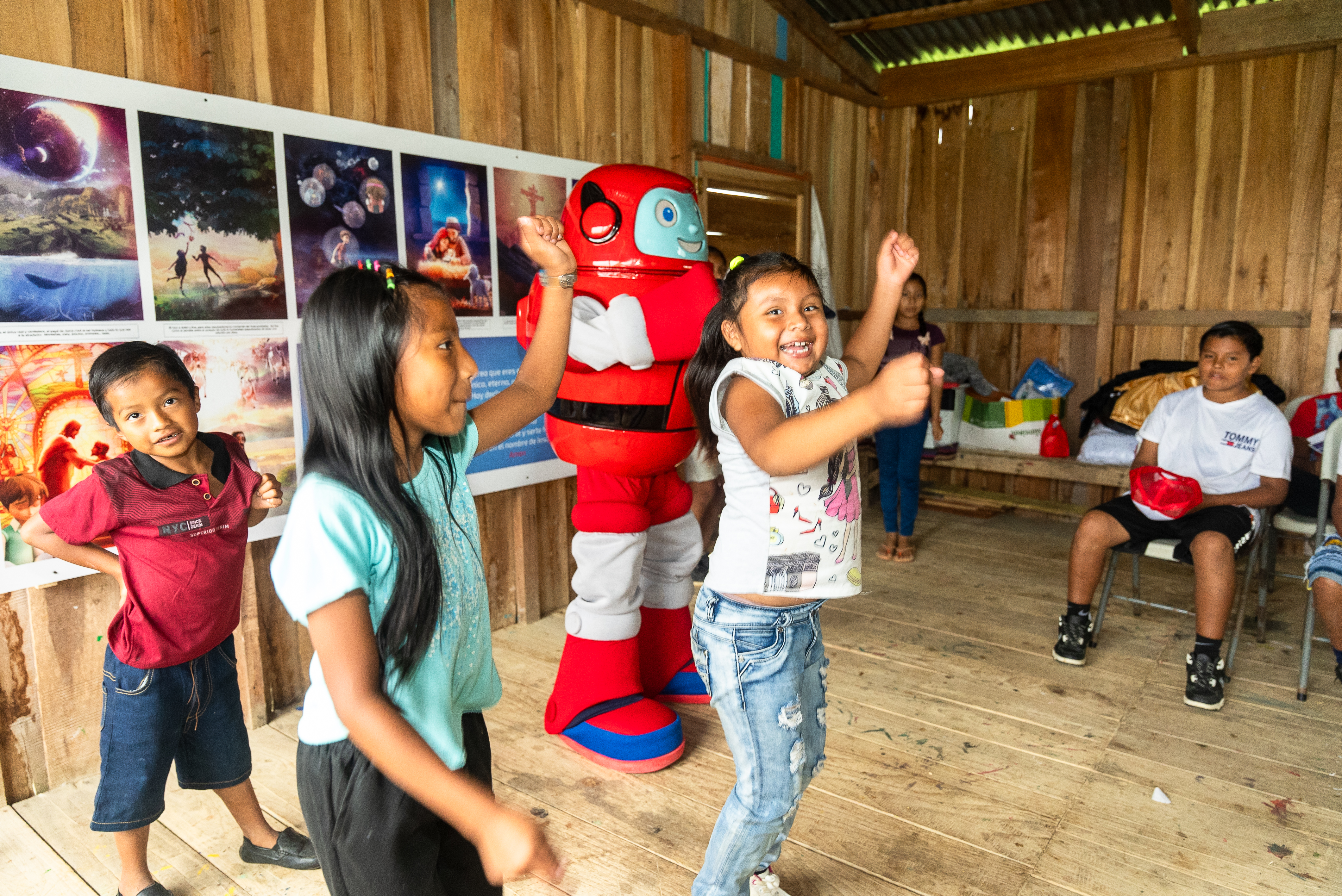 Children dance along to the Salvation Poem with Gizmo.