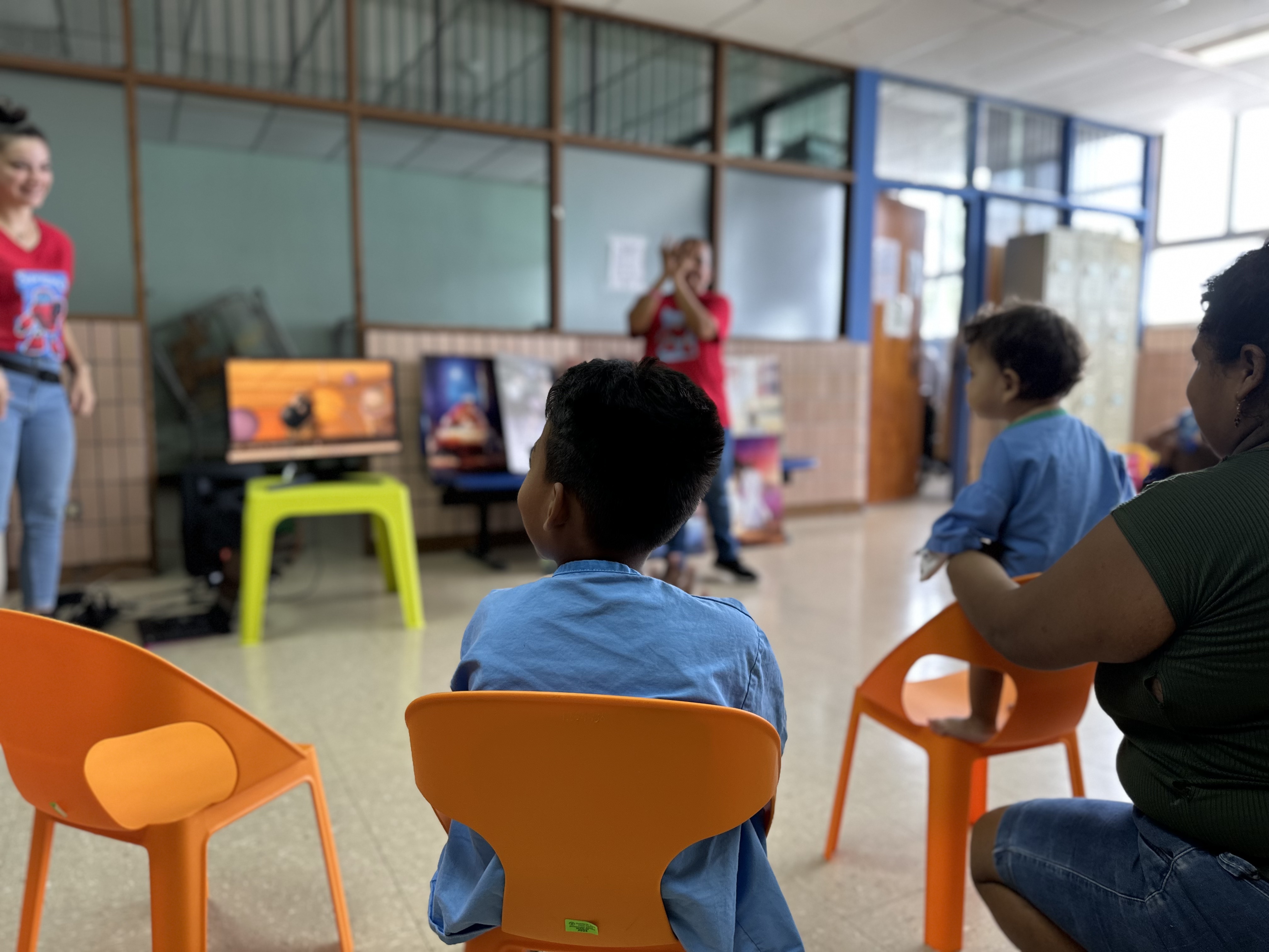 A child at Tony Facio Pediatric Hospital in Costa Rica listens intently to the message from the Superlibro team.