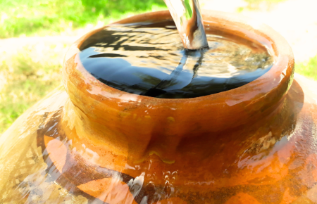 overflowing water jug