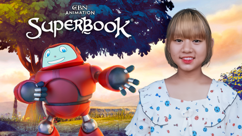 Soe, a young girl in Myanmar, smiles brightly at the camera on the right side of frame. Gizmo stands behind her to the left, reaching forward. The CBN Animation and Superbook logos are stacked above Gizmo.