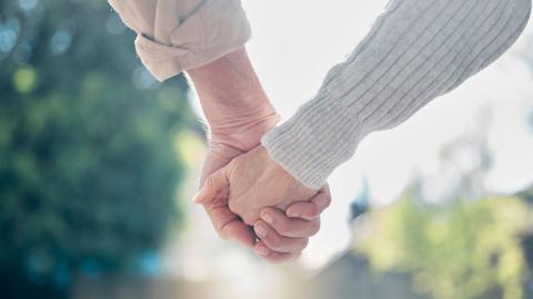 Couple holding hands