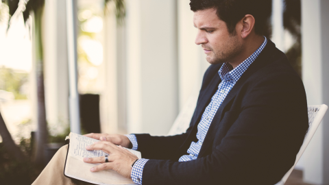 businessman-reading-bible-1200.png