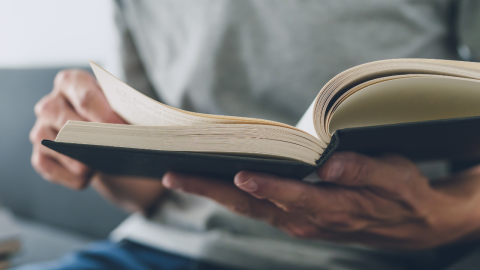 man-reading-book-1200.png