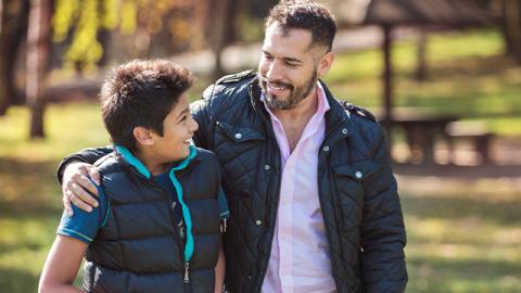 happy father and teen son