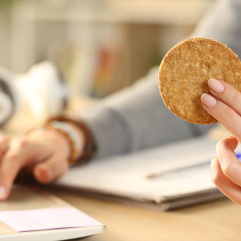 Woman holding a cookie 